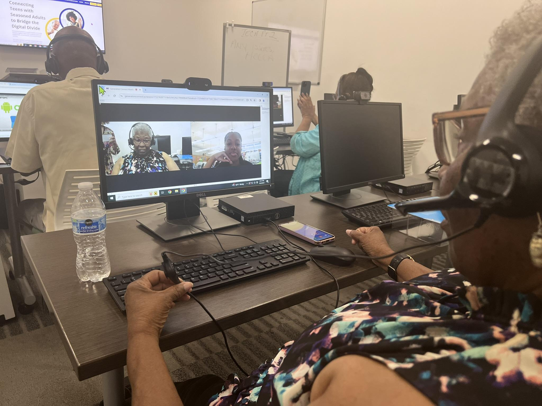 Seasoned Adults taking part in a live Generation Connect technology session.