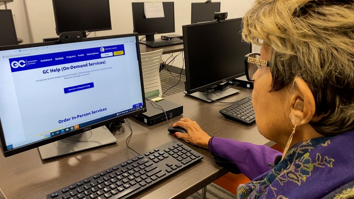 A Seasoned Adult using Generation Connect at a community computer lab.